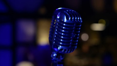 Old microphone in the club. Soft refocus, easy forward and backward movement
