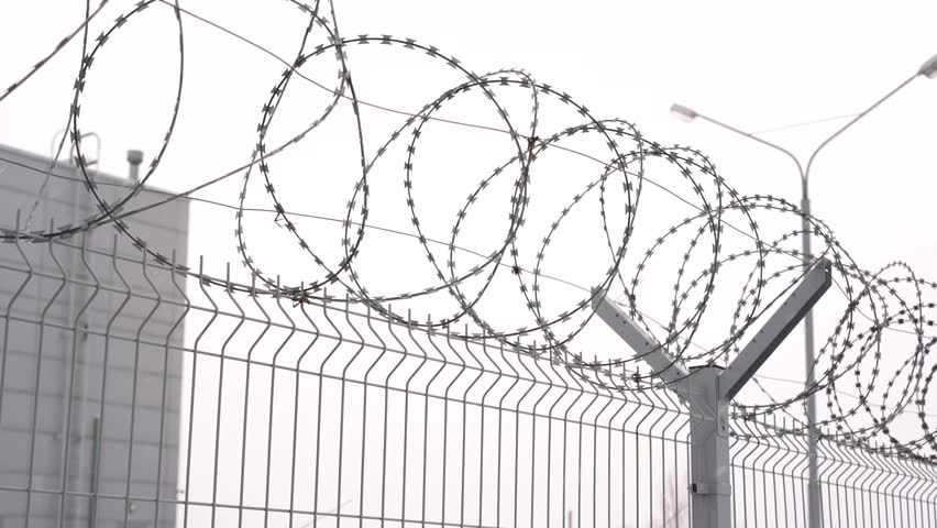 barbed wire on fence