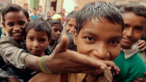 Children in India want to get into the camera's eye.. MAY 2015. Varanasi, India