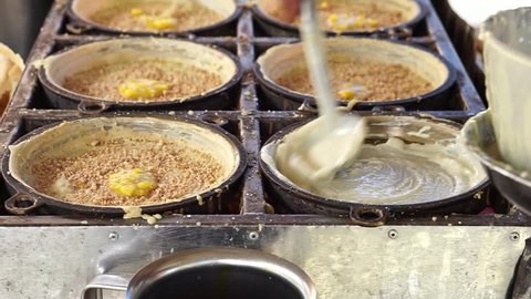 Apam Balik in Malaysia (English: 'turnover pancake') or Bulan Terang (English: 'full moon') in Indonesia is a common griddle pancake in Southeast Asia. Crispy type.