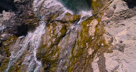 Beautiful aerial view of a waterfall in the  mountain