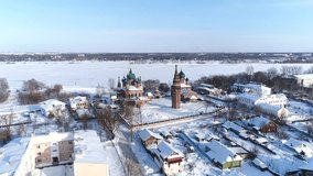 View from the height of the temple complex in winter. Zlatoust Church and Vladimir Church. Yaroslavl, Korovniki.