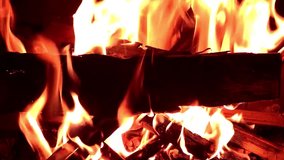 Burning Wood In The Fireplace, Fire flame close up loopable - Stock Video. Loopable flame, 1920x1080, FHD.