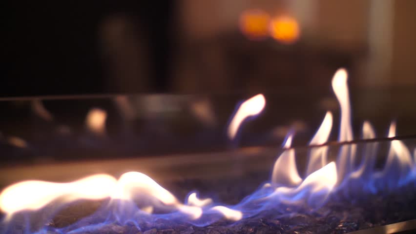 Fire flame flames in a modern fireplace roaring gas burning outdoors at night Royalty-Free Stock Footage #1007465122