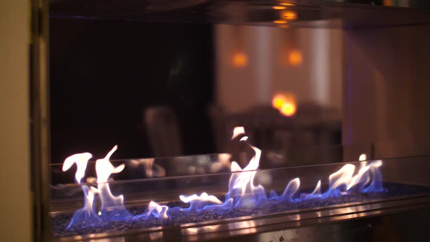 Fire flame flames in a modern fireplace roaring gas burning outdoors at night Royalty-Free Stock Footage #1007465143