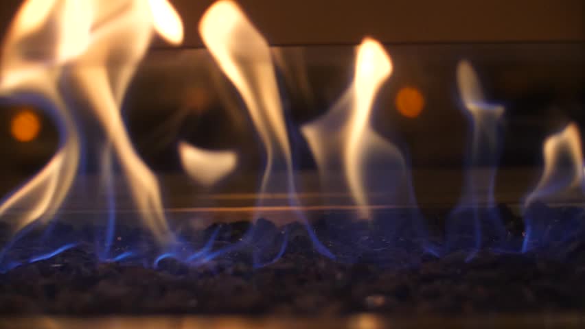 Fire flame flames in a modern fireplace roaring gas burning outdoors at night Royalty-Free Stock Footage #1007465146