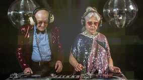 an amazing grandma and grandpa, older couple djing and partying in a disco setting. this version has overlayed video distortion and glitch effects