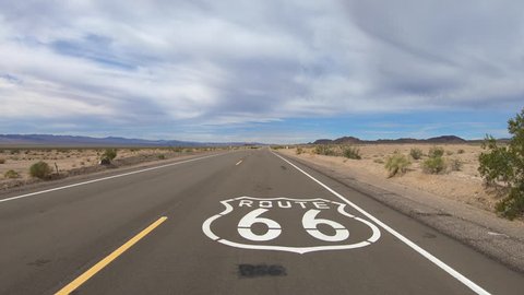 Aerial view of Route 66 pavement sign in the vast California Mojave desert.