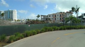 Construction fence flyover reveal destruction site