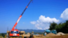 Truck Crane and Concrete Mixer Truck at House Construction Site Blurred Background, Asia Laos 4k Video Footage Clip