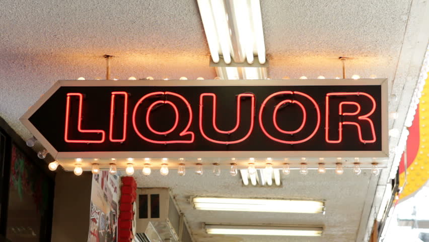 Sign for liquor flashing at store