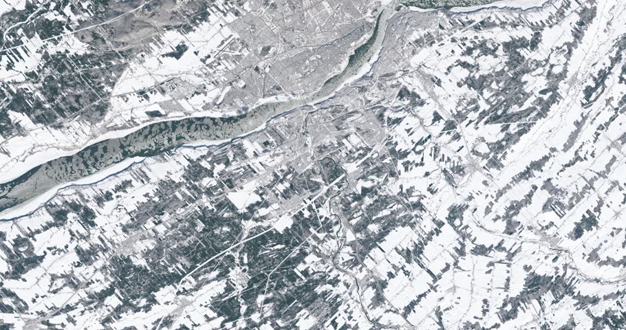 Very high-altitude overflight aerial of Quebec City, Canada, in winter. Clip loops and is reversible. Elements of this image furnished by NASA