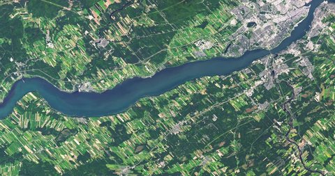 Very high-altitude overflight aerial of St. Lawrence River, Quebec, Canada. Clip loops and is reversible. Elements of this image furnished by NASA