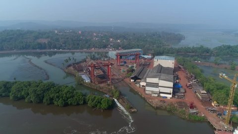 Shipyard on Zuari river in Goa, India. Shooting with drone.