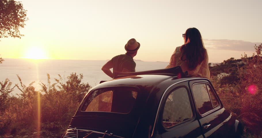 Beautiful Young Couple On Honeymoon By Old Retro Car Enjoying Sunset Flare Happiness Happiness Seeker Italy Adventure Slow Motion Shot Red Epic 8k Royalty-Free Stock Footage #1007526352