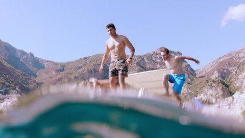 Male Friends Jumping Into The Ocean from Boat Extreme Sports Fun Time Summer Vacation Slow Motion Underwater Shot Red Epic 8k