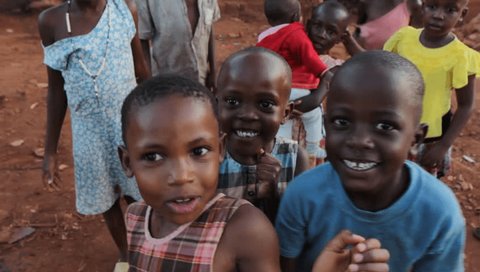 Lugazi, Uganda. 13 June 2017. A bunch of smiling Ugandan children in a rural area. (No editing in post at all of the footage.)