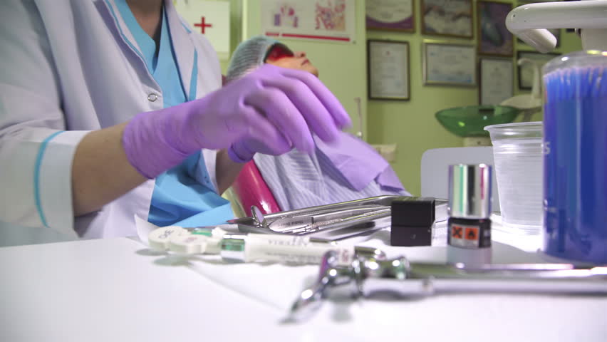 Dentist's Hands and Patient Royalty-Free Stock Footage #1007542042