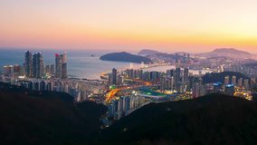 Aerial view timelapse video of Busan city at night, South Korea.