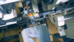 Top view of wrapped up candies being piled up in a box - Powered by Shutterstock - Get 15% off with code: PIKWIZARD15