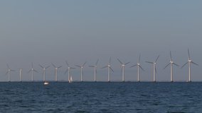 Stock video of wind mills at sea