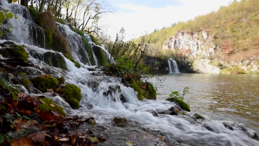 Waterfall and lake inside the Plitvice Lakes National Park. Croatia. Europe.