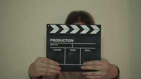 girl with clapper board
