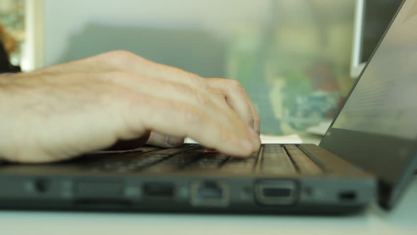 Developer hands working on laptop without mouse uses trackpad in his cubicle Royalty-Free Stock Footage #1007600818