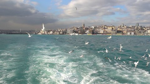 Istanbul, Turkey - 15th of January 2018: 4K Beautiful view on Galata from the Bosphorus 
