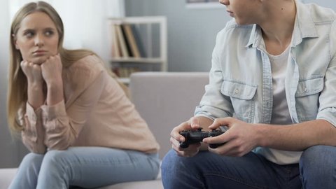 Boring Date. Excited Black Guy Playing Video Games and Ignoring Girlfriend  Next To Him Stock Image - Image of enjoy, conflict: 188745699