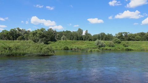 Rapid river at sunny summer day, 4K ultra hd video footage