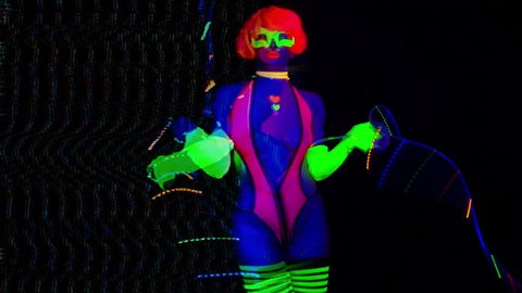 sexy female disco dancer poses in UV fluorescent costume with overlayed video glitch and distortion