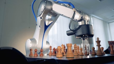 Artificial intelligence, machine intelligence concept. Innovative robot playing chess.