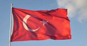 Turkish flag in blue sky flap 
