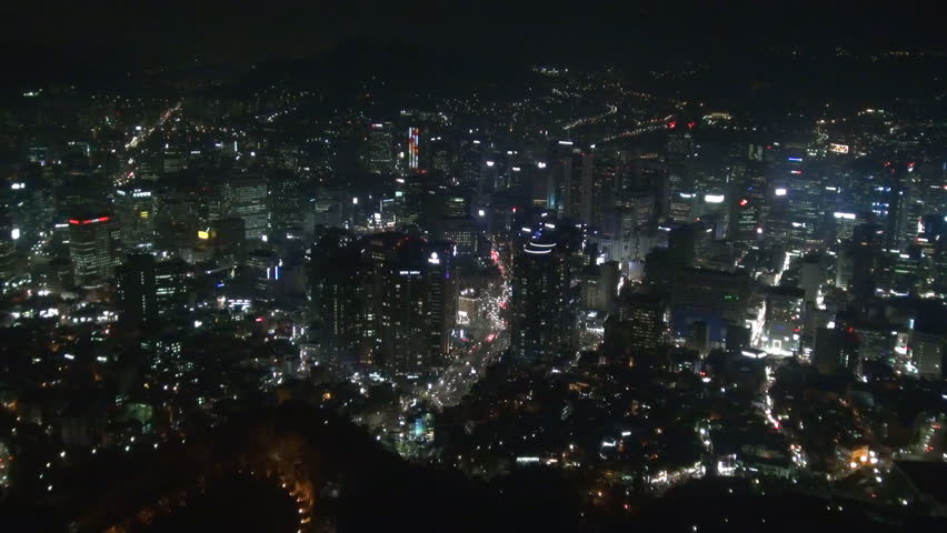 SEOUL - APRIL 20, 2012, Beautiful city panorama by night, modern skyscraper and busy traffic car | Shutterstock HD Video #1007716918