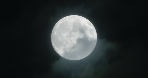 Full moon with stormy clouds, 4k