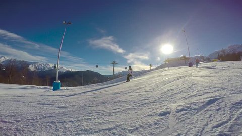 The downhill skiing. Caucasian mountains. Ski resort "Rosa Khutor". Sochi. Russia.