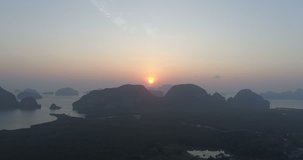 Aerial drone view of sunset at tropical Phang-nga bay in Thailand 