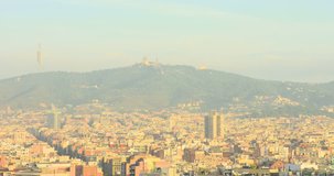 BARCELONA, CATALONIA - JULY 15th 2017: View of Barcelona from above hill. Summer sunny day morning. House rooftop. High definition video.