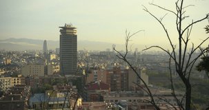 BARCELONA, CATALONIA - JULY 15th 2017: View of Barcelona from above hill. Summer sunny day morning. House rooftop. High definition video.