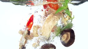 fresh vegetables falling with water on white background in slow motion - Powered by Shutterstock - Get 15% off with code: PIKWIZARD15