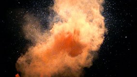 Orange balloon pops and creates powder / glitter explosion in slow motion at 960fps - Powered by Shutterstock - Get 15% off with code: PIKWIZARD15