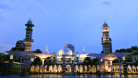 Kuala Lumpur, Malaysia: January 25, 2018: Sultan Abdul Samad Jamek Mosque at sunset in Kuala Lumpur, Malaysia