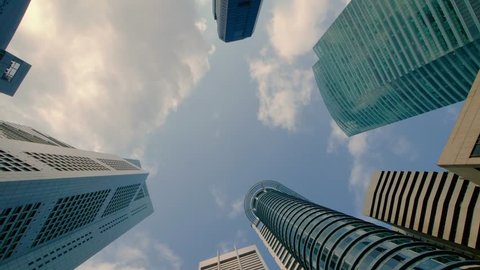 Zooming Time Lapse of Clouds Over Skyscrapers in the Central Business District of Singapore