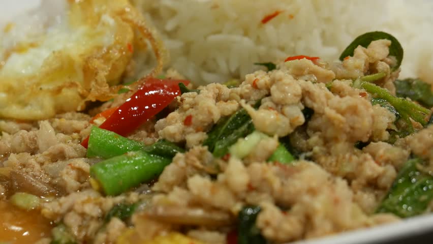 Fried basil and pork with rice and egg