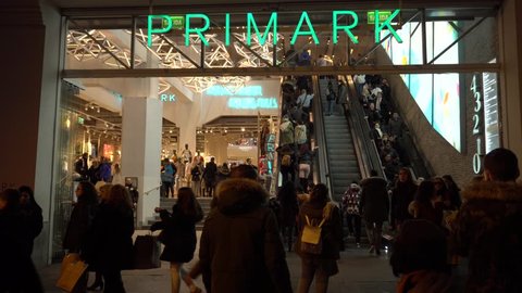 MADRID, SPAIN 11 FEBRUARY 2018: Entrance of the Primark store at Gran Via in Madrid. Shopping custumers in the biggest Primark store in Europe