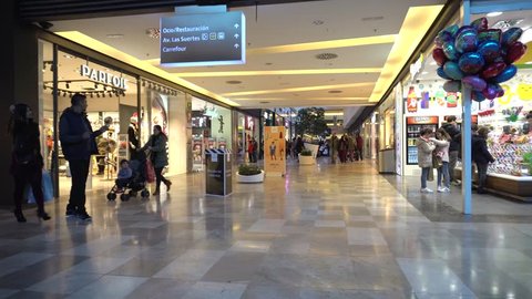 MADRID, SPAIN 10 FEBRUARY 2018: Crowd Of Walking People In Shopping Mall Center.Shopping custumers at the mall center