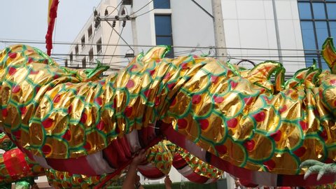 Nakhon Sawan, Thailand-February 18, 2018: Dragon dance/lion dance in Nakhon Sawan to celebrate Chinese New Year in Thailand.