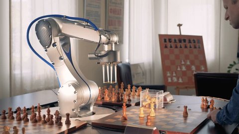 Robotic hand playing chess. Artificial intelligence concept. 4K.