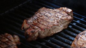 High quality video of cooking steaks on the fire in real 1080p slow motion 120fps
